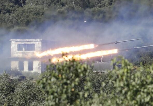 Russian rockets fired during exercises this month. Photo: Yuri Kochetkov/EPA, via Shutterstock.