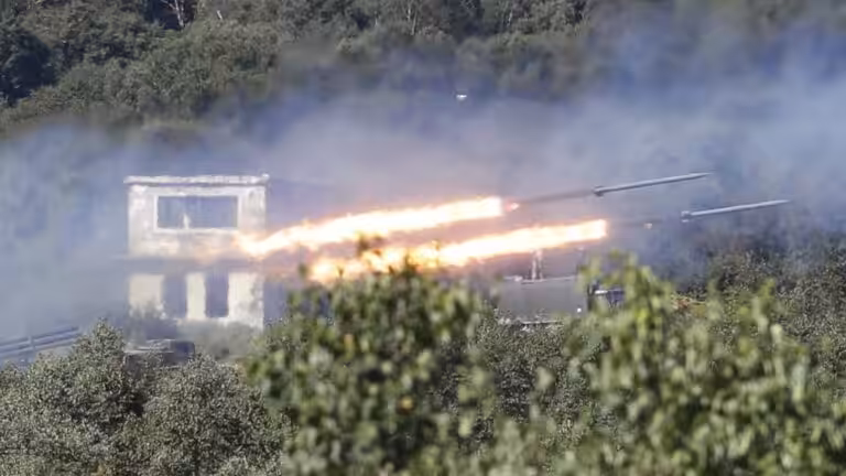 Russian rockets fired during exercises this month. Photo: Yuri Kochetkov/EPA, via Shutterstock.