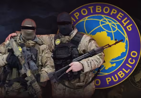 Photographic composition that shows two uniformed Ukrainians with their eyes crossed out in front and the symbol of the Mirotvorets organization in the background. File photo.