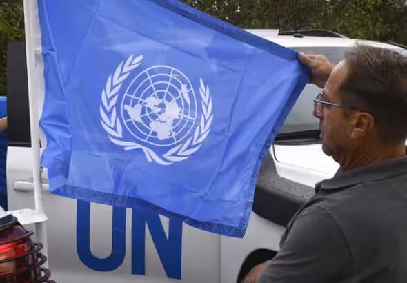 Members of the International Atomic Energy Agency (IAEA) mission prepare to visit the Zaporozhye nuclear power plant, September 1, 2022. © AP Photo/Andriy Andriyenko