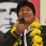 President Evo Morales giving a speech with a big banner of Che Guevara in the background. File photo.