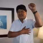 Evo Morales raising his fist. Photo: Alina Duarte.