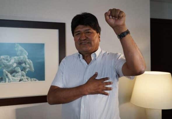 Evo Morales raising his fist. Photo: Alina Duarte.