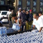 Community water distribution in Jackson, Mississippi. Photo: AP/Steve Helber.