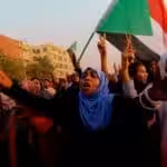 Sudanese protesters march during a demonstration to commemorate 40 days since a sit-in massacre, in Khartoum, Sudan, July 13, 2019. Photo: Thomson Reuters.