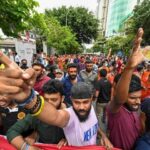 Sri Lankan university students take part in a demonstration in Colombo on August 18. File photo.