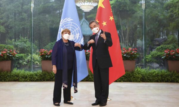 UN High Commissioner for Human Rights Michelle Bachelet (left) and Chinese Foreign Minister Wang Yi (right) during Bachelet's trip to China. Photo: Deng Hua/AP.