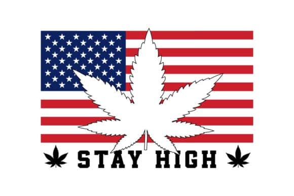 US flag with a marijuana leaf silhouette over it and a caption that reads: "Stay High." File photo.