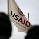 The USAID flag. Photo: Graeme Sloan/SIPA USA.