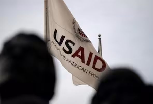 The USAID flag. Photo: Graeme Sloan/SIPA USA.