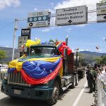 A truck crosses the Simón Bolívar bridge from Venezuela to Colombia during the border reopening ceremony, in Cúcuta. Photo: Mario Caicedo/EFE.