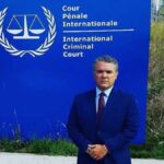 Former president of Colombia, Iván Duque, posing in front of the International Criminal Court headquarters. File photo.