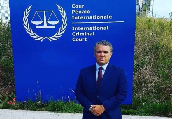 Former president of Colombia, Iván Duque, posing in front of the International Criminal Court headquarters. File photo.