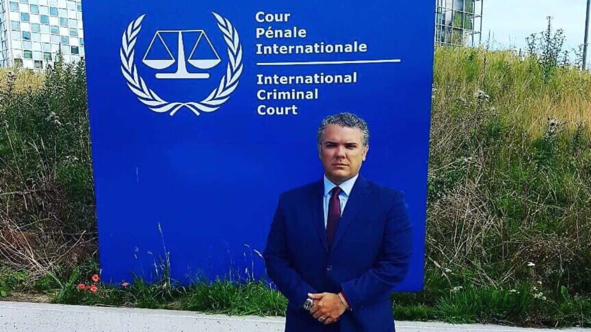 Former president of Colombia, Iván Duque, posing in front of the International Criminal Court headquarters. File photo.