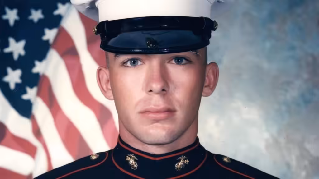 Photo of Matthew Heath in uniform during his active duty days, US flag in the background. According to media reports he later joined mercenary firms like MVM Inc.. Photo: Tennessean.com.