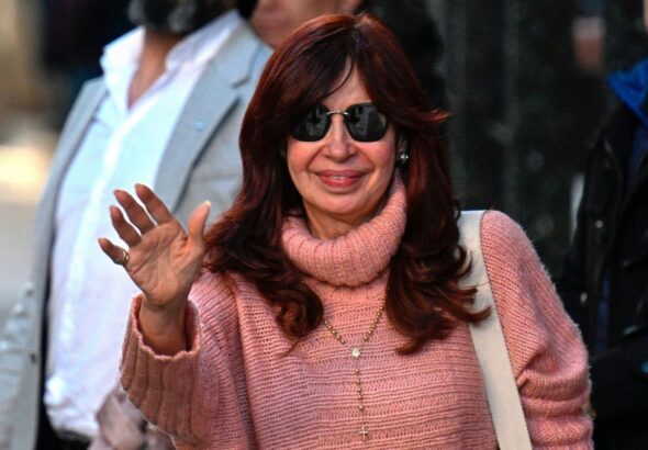 Argentine Vice President Cristina Kirchner greets her supporters as she leaves her residence in Buenos Aires, on September 2, 2022. Photo:LUIS ROBAYO