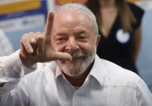 President-elect of Brazil Luiz Ignacio Lula Da Silva, doing the Lula hand sign a few moments after casting his vote in the second round of Brazilian presidential elections. Photo: BBC.