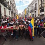 Flower farmers march in Quito. Photo: Popular Resistance.org.