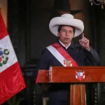 President Castillo standing at the presidential podium. On December 7, Castillo was removed from the presidency by Congress and replaced by his VP Dina Boluarte. File photo.