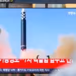 A television screen in Seoul shows a news program reporting the latest missile launch by North Korea. Photo: Kim Jae-Hwan.