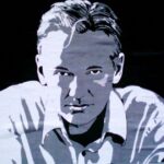 A photograph taken of a poster depicting Julian Assange. Photo: Counter Punch/Jose Mesa