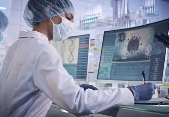 Two female scientists in a laboratory. Photo: Getty Images.