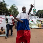 Young men chant slogans against the power of Lieutenant-Colonel Damiba, against France and pro-Russia, in Ouagadougou, Burkina Faso, Sept. 30, 2022. Photo: Sophie Garcia/AP.
