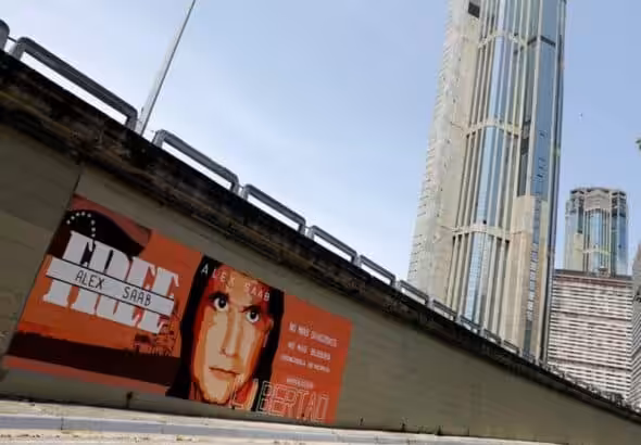 A #FreeAlexSaab banner in a Caracas street, with the Parque Central building in the background. Photo: Reuters.