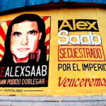 Poster in a street of Caracas with the face of Alex Saab and the following text: “FreeAlexSaab, you have not been able to bend him. Alex Saab was kidnapped by the empire,Venceremos!” Photo: William Camacaro.