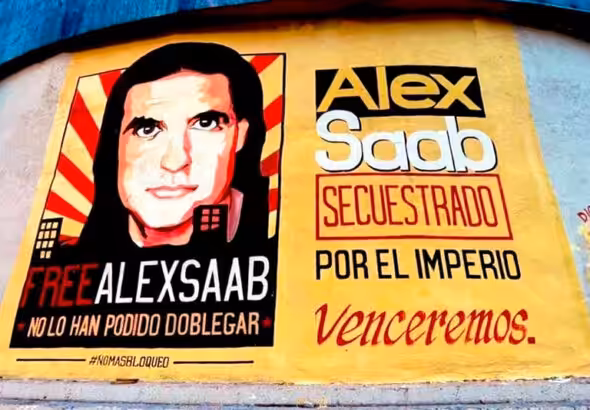 Poster in a street of Caracas with the face of Alex Saab and the following text: “FreeAlexSaab, you have not been able to bend him. Alex Saab was kidnapped by the empire,Venceremos!” Photo: William Camacaro.