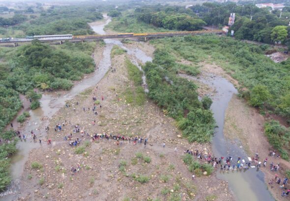 Colombia-Venezuela border. One of many illegal trails,this one just next to the Simon Bolivar International Bridge near Cucuta. Photo: Juan Pablo Cohen/La Opinion.