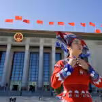 A delegate outside the Great Hall of the People in Beijing, China, where the 20th CPC National Congress was held. Photo: CFP.