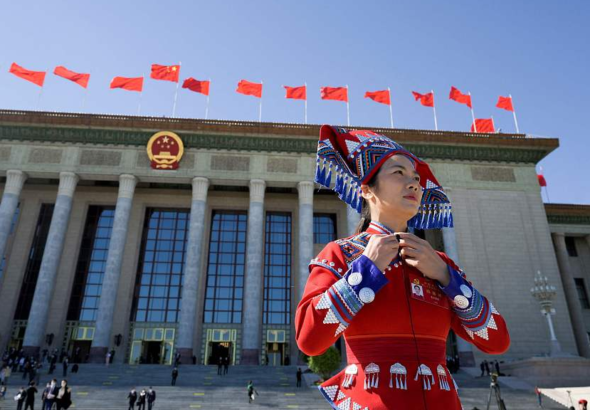 A delegate outside the Great Hall of the People in Beijing, China, where the 20th CPC National Congress was held. Photo: CFP.