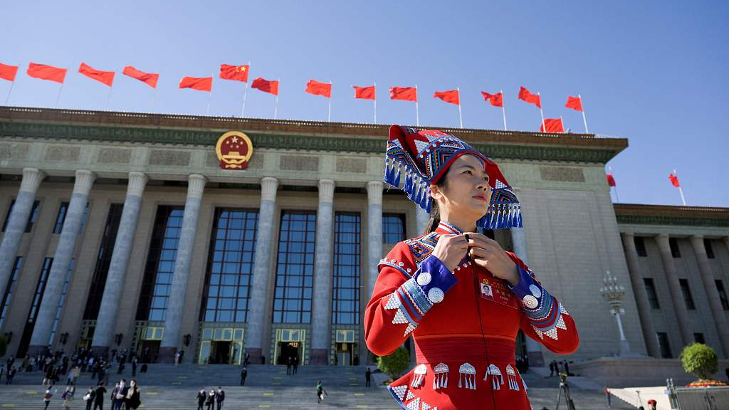 A delegate outside the Great Hall of the People in Beijing, China, where the 20th CPC National Congress was held. Photo: CFP.