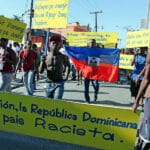Haitians in Haiti demonstrate against racist discrimination in the Dominican Republic. Photo: Marie Arago/Reuters.