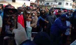 Venezuelan President Nicolás Maduro giving a hug to a small girl that reached him and embraced him during his visit to Las Tejerías, Aragua state, after a tragic landslide hit the small town. Photo: Globovisión.