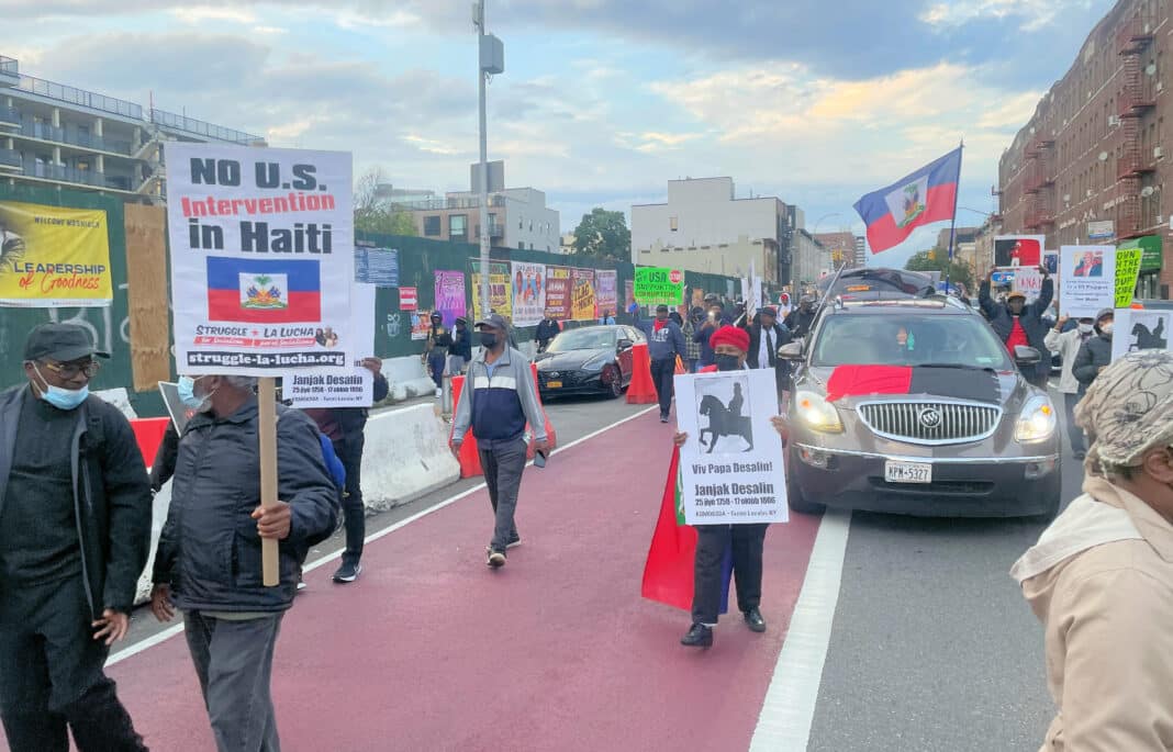 About 60 Haitians marching down Brooklyn’s Nostrand Avenue on October 17, 2022. Photo: Kim Ives/Haïti Liberté.