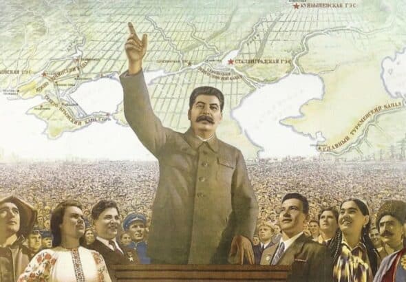 Poster titled "Forward to Communism" showing Stalin leading thousands of people. Photo: Russian State Library.