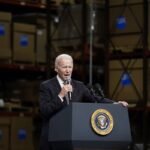 President Joe Biden standing at a presidential podium with a microphone. Photo: Whitehouse.gov.
