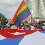 People marching with the flag of Cuba and with the LGBT flag. Photo: Ernesto Mastrascusa/Latin Content/Getty Images/Archive.