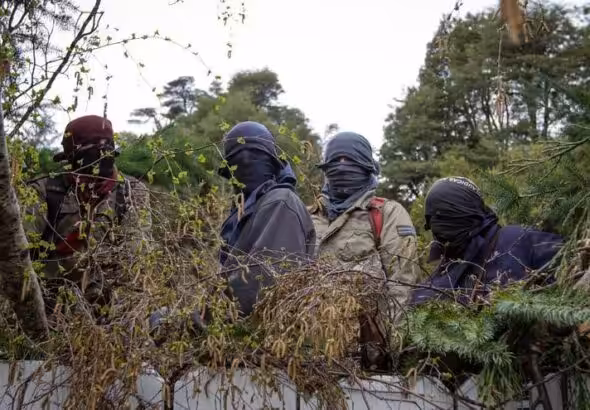 Members of the Lof Lafken Winkul Mapu in their last interview prior to the eviction. Photo: Eugenia Neme.