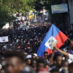 Reference photo: Demonstrators march during a demonstration called by artists to demand the resignation of Haitian President Jovenel Moise, in the streets of Petion Ville, Port-au-Prince, Haiti, October 13, 2019. Reuters/Andres Martinez Casares.