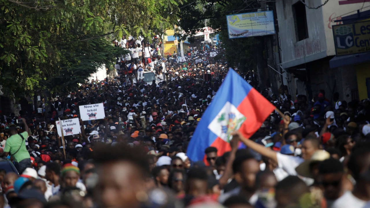 Reference photo: Demonstrators march during a demonstration called by artists to demand the resignation of Haitian President Jovenel Moise, in the streets of Petion Ville, Port-au-Prince, Haiti, October 13, 2019. Reuters/Andres Martinez Casares.