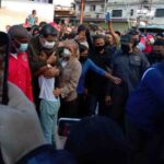 Venezuelan President Nicolás Maduro giving a hug to a small girl that reached him and embraced him during his visit to Las Tejerías, Aragua state, after a tragic landslide hit the small town. Photo: Globovisión.