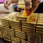 Gold ingots being piled on a table. Photo: RedRadioVE/File photo.