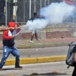 Far-right opposition groups demonstrating in the streets of the city of Santa Cruz, Bolivia. Photo: Getty Images.