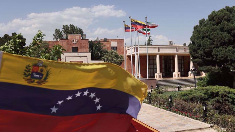 The flags of Iran and Venezuela are seen when Venezuelan President Nicolas Maduro arrives at Mehrabad Airport in Tehran, June 10, 2022. Photo by Reuters.