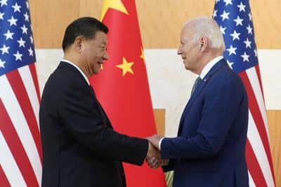 Biden and Xi shake hands. Photo: AP News.