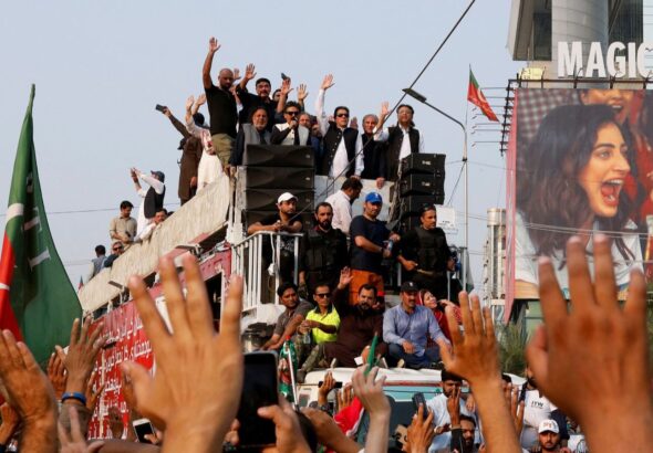 Massive protests in support of Imran Khan. Photo credit: Reuters/Akhtar Soomro.