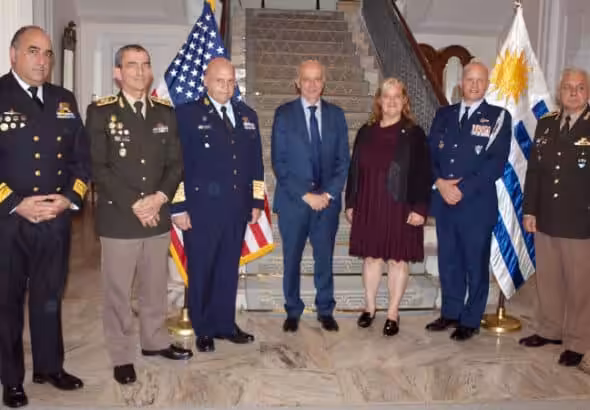 The U.S.’s Charge d’Affaires in Uruguay, Ms. Jennifer Savage, hosting a meeting at the US Chief of Mission's residence. Joined by Uruguayan Minister of Defense, Dr. Javier Garcia, military leaders, and more civilian members that support the military. Photo: US Embassy in Uruguay.